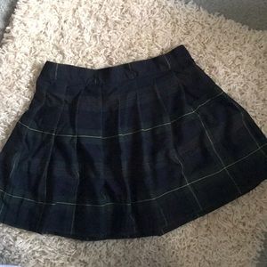 Green plaid skirt with matching tie